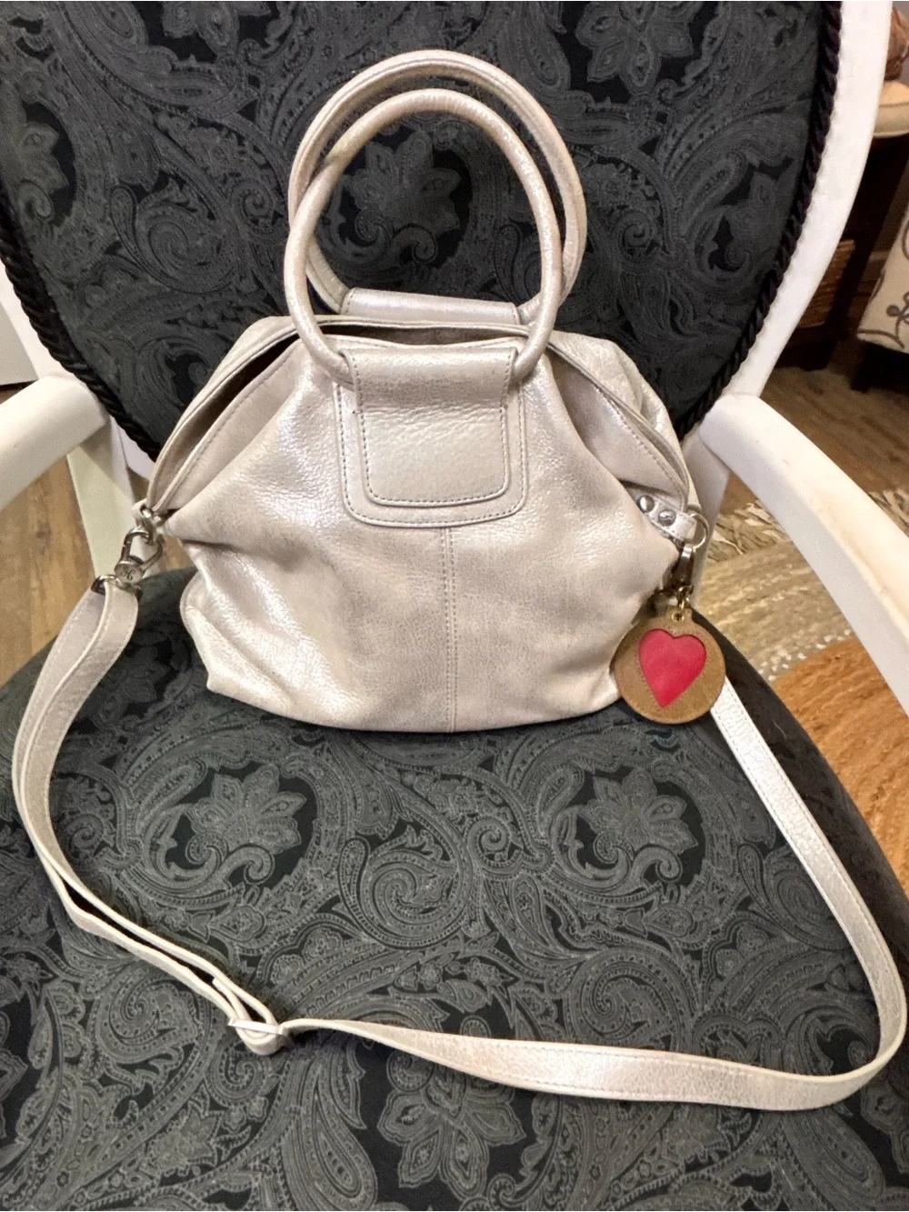 hOBO Metallic Silver Women’s Satchel Bag with Heart Charm